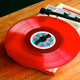 Illustration for article titled Even On a Tablet, iTunes Cant Compete with Red Vinyl